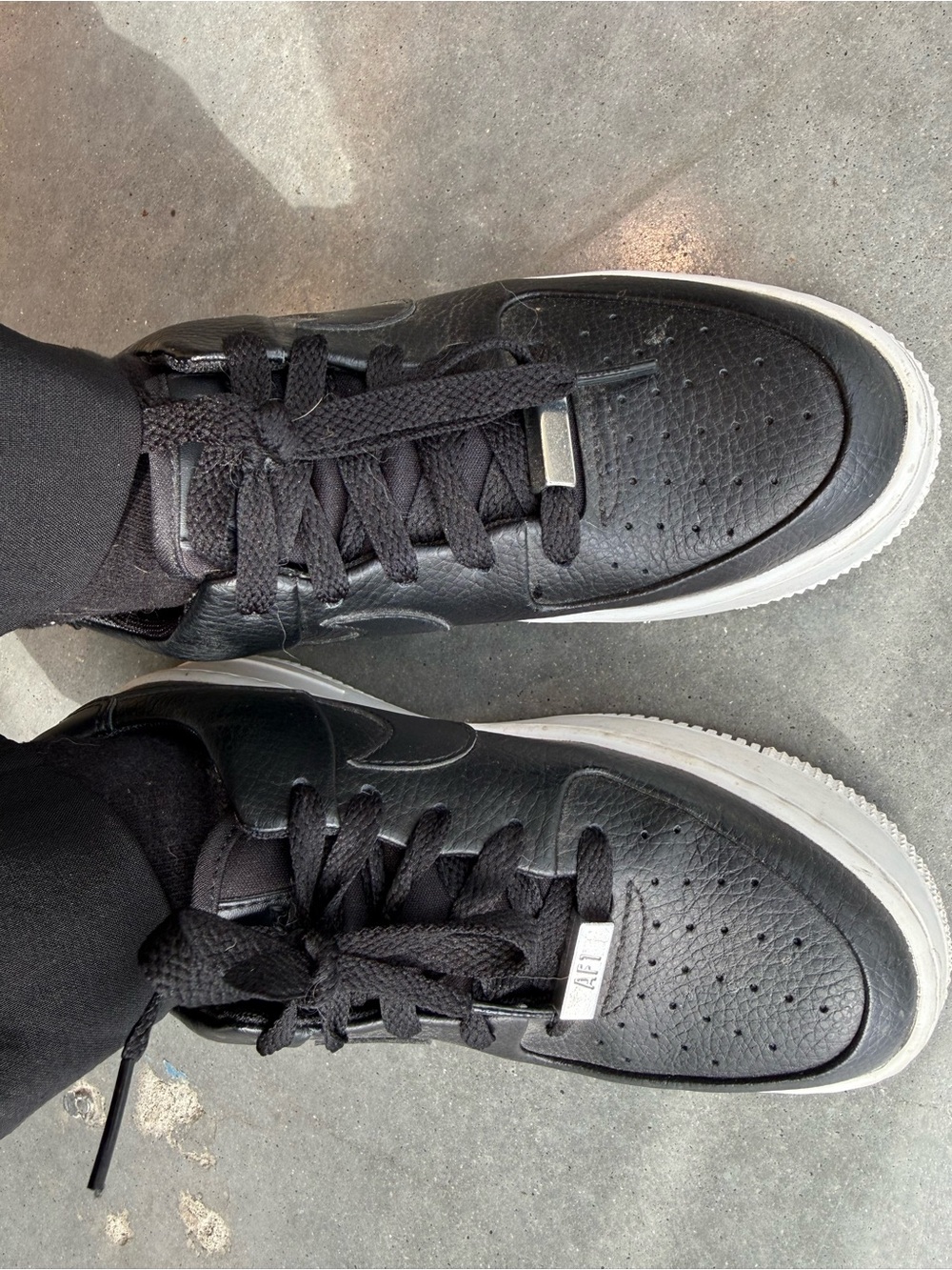 Nike Women's Black Sneakers with White Soles